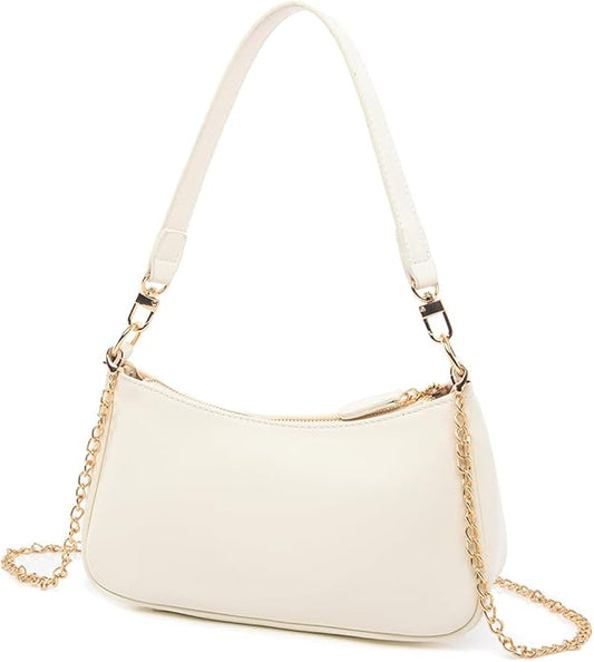 White handbag with gold chain strap on a white background