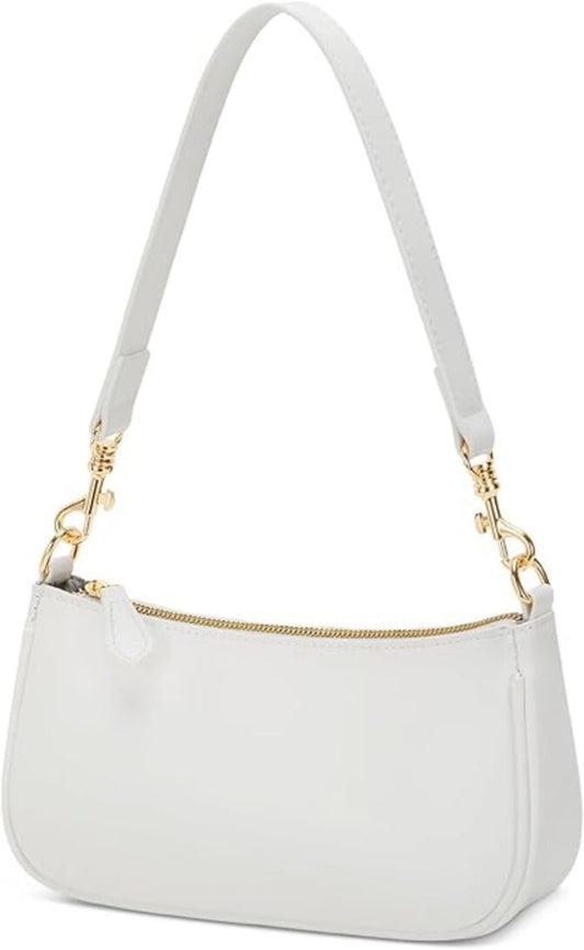 White handbag with gold accents on a white background